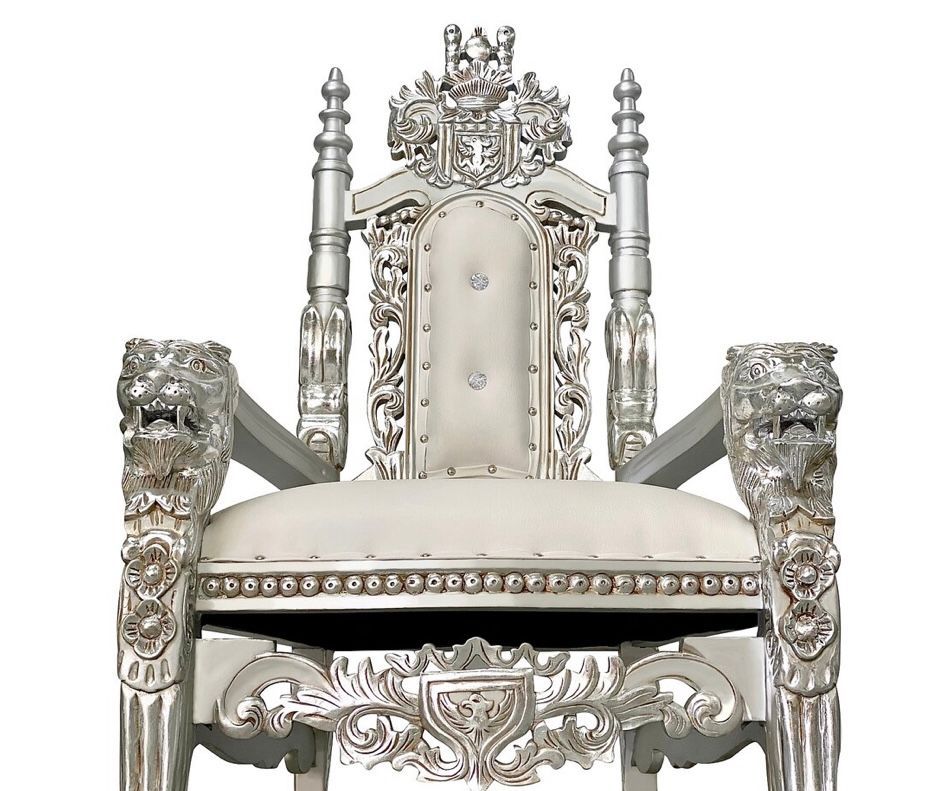 A silver throne chair with a white cushion on a white background