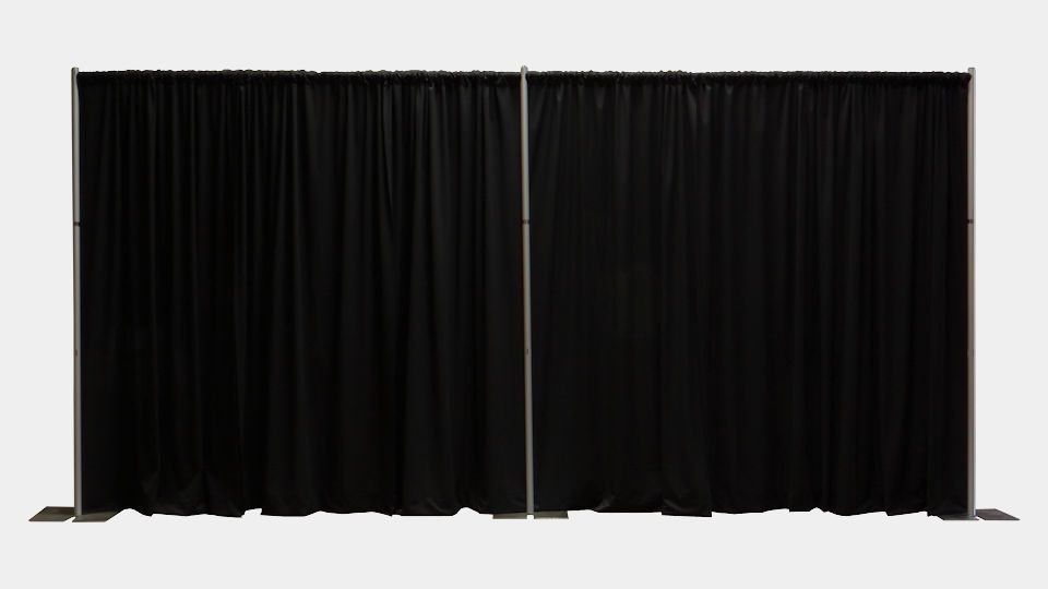 A pair of black curtains on a white background.