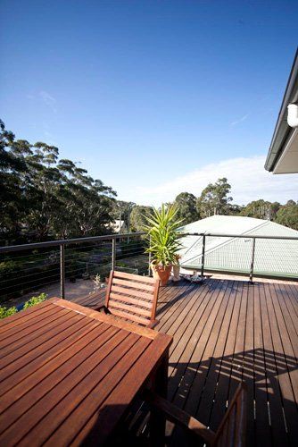 Pacific Palms House Balcony with Table - Barry Pfister Builder In Forster, NSW