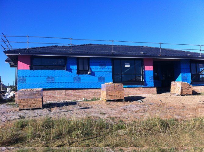 Tuncurry Pile of Bricks for the House - Barry Pfister Builder In Forster, NSW