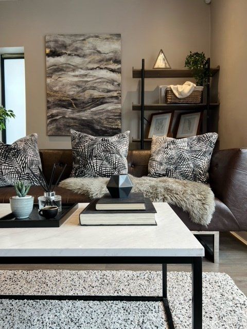 A living room with a couch and a coffee table