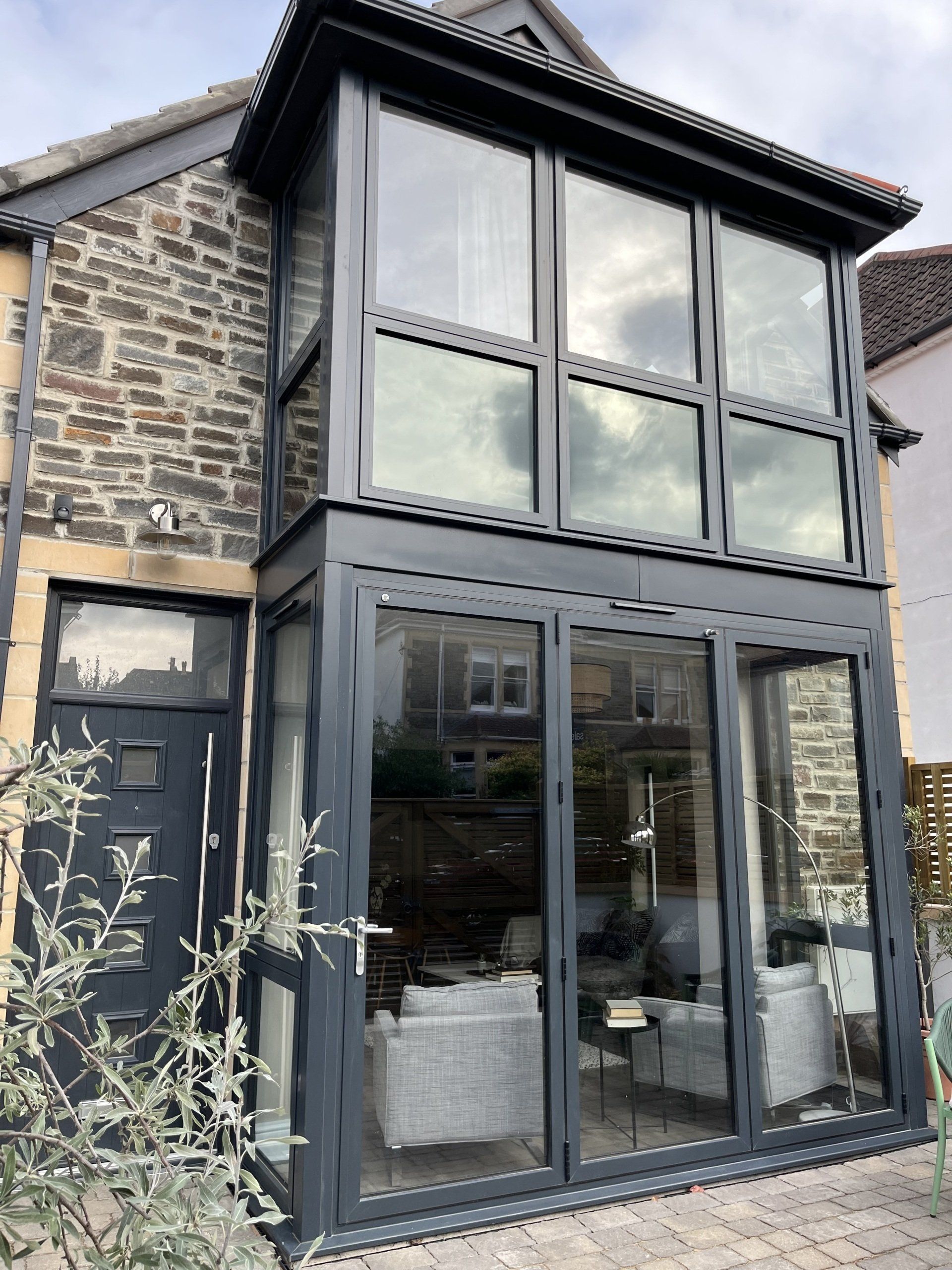 A large house with a lot of windows and doors