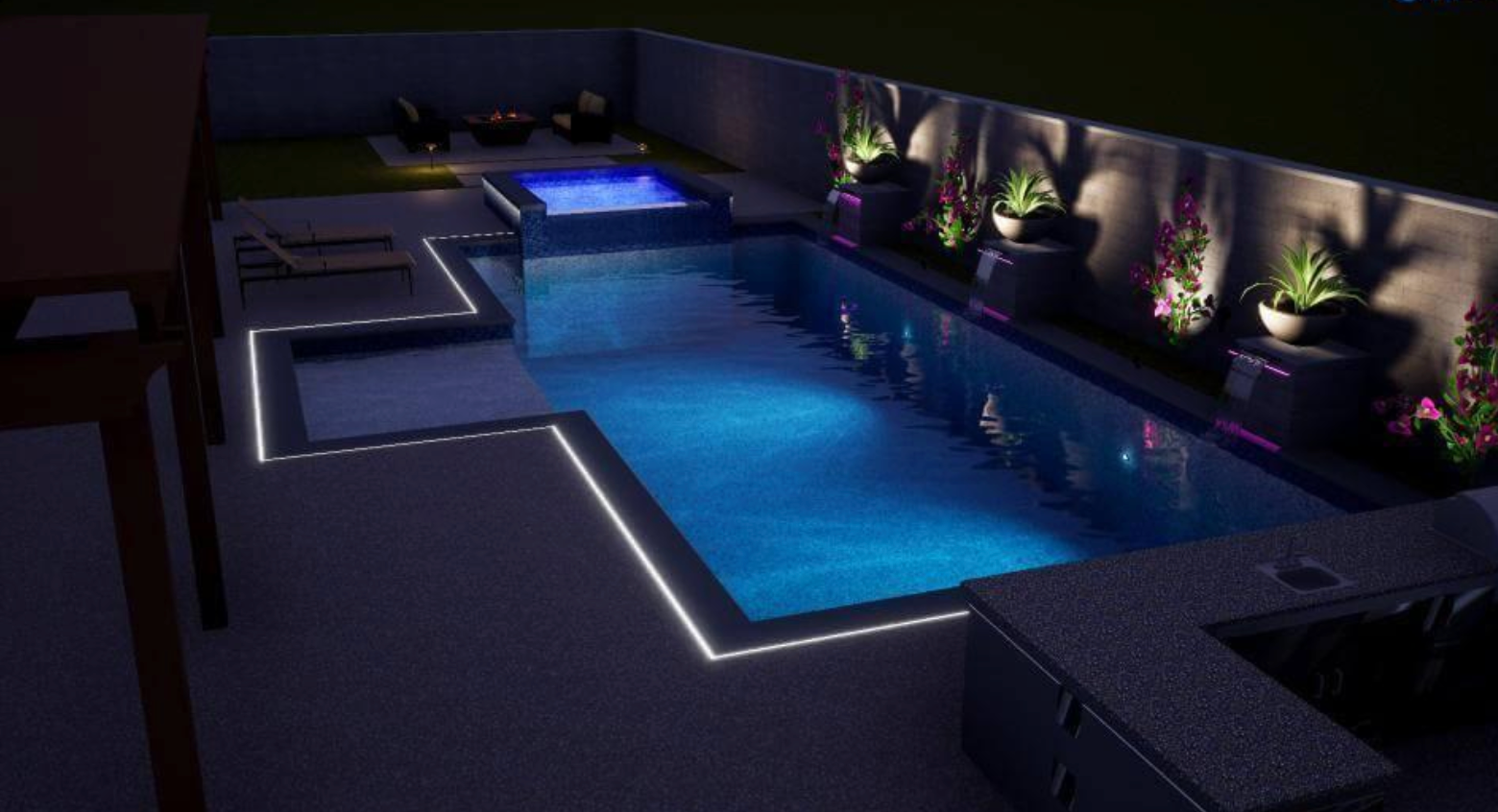 A large swimming pool is lit up at night.