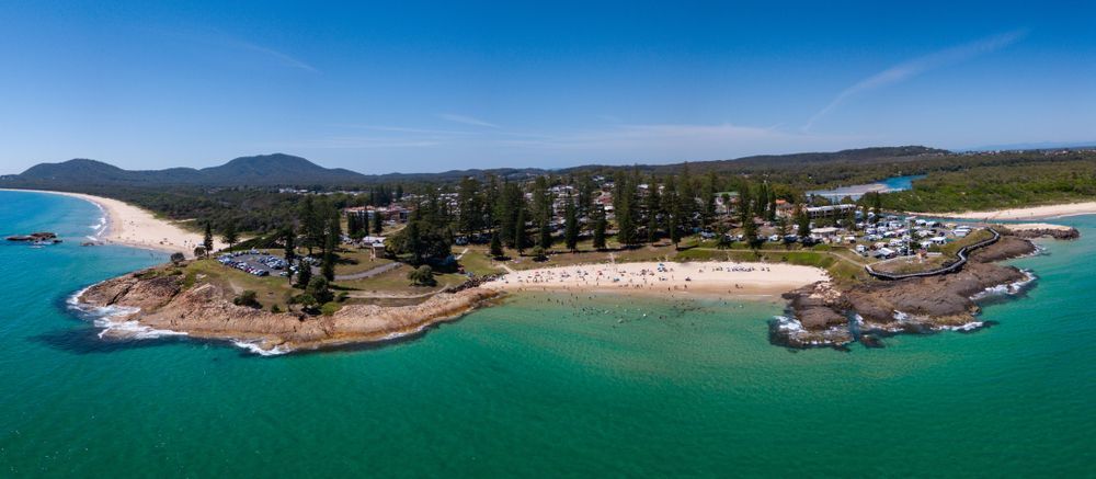 An aerial view of a small island in the middle of the ocean — HI PSI Hydraulics in South West Rocks, NSW