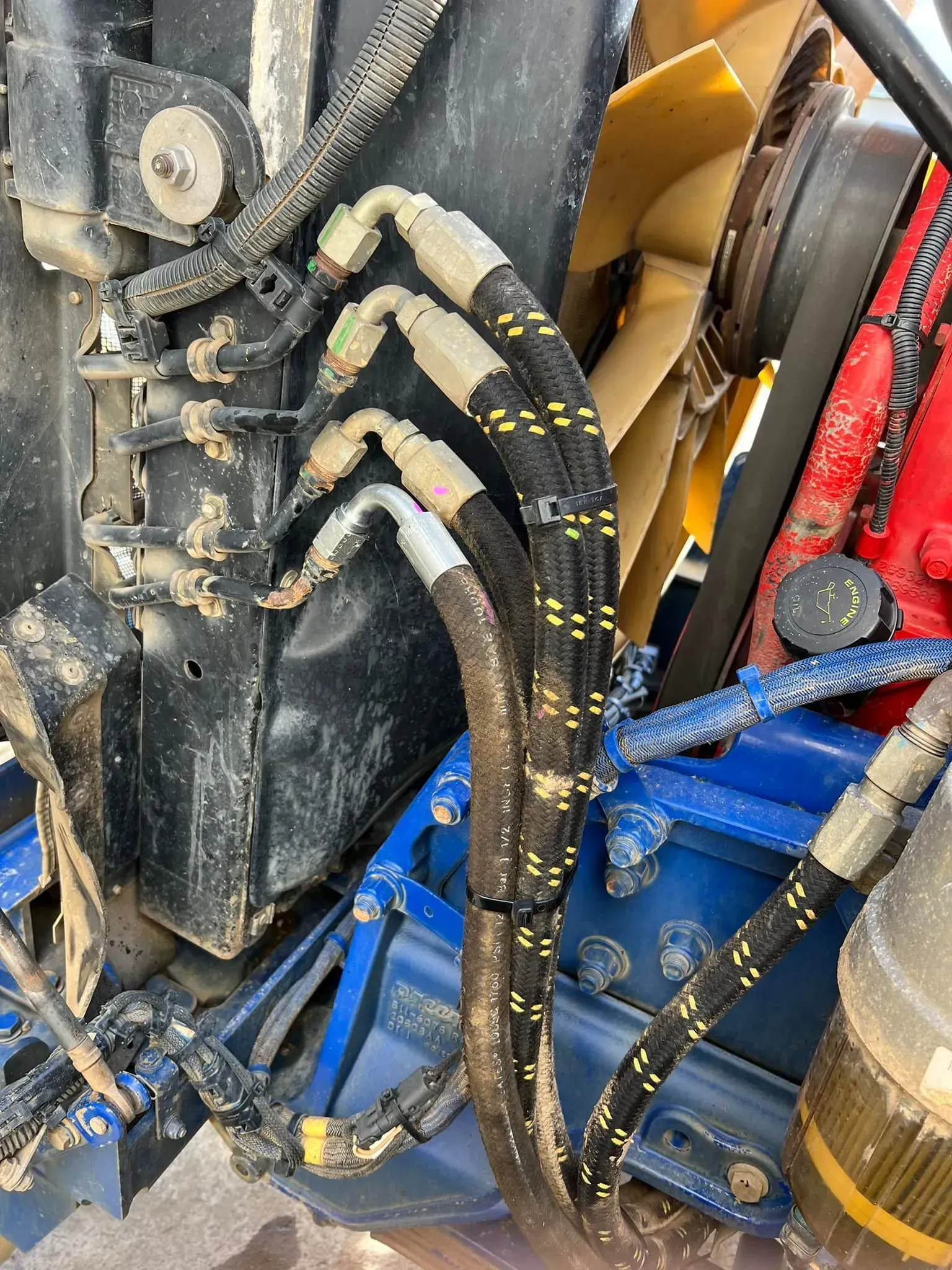 A Close Up Of A Hose On A Machine With A Fan — HI PSI Hydraulics in Harrington, NSW
