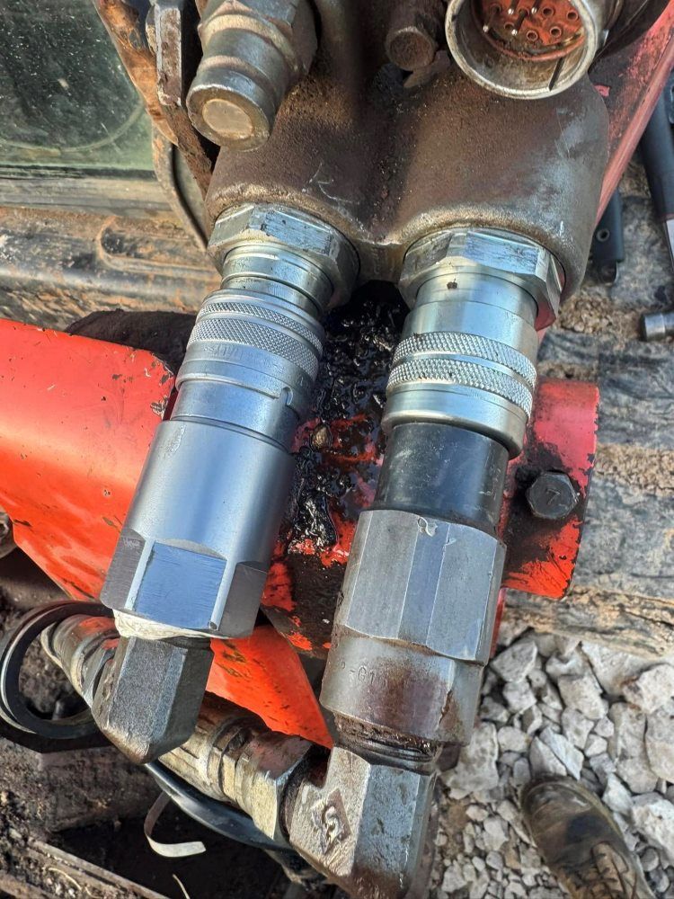 A close up of a hydraulic hose on a machine. — HI PSI Hydraulics in Wauchope, NSW