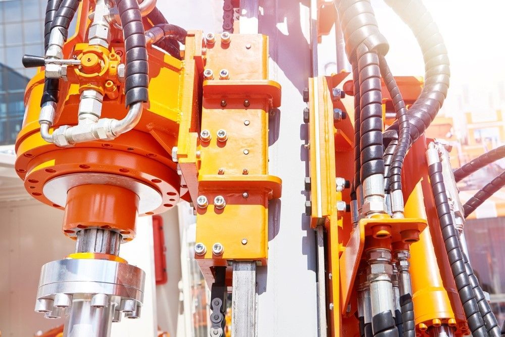 A Close Up Of A Machine With Hydraulic Hoses Attached To It — HI PSI Hydraulics in Forster, NSW