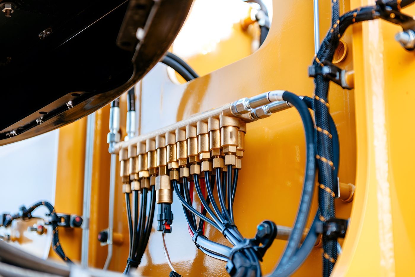 Four Different Types Of Hydraulic Connectors Are Sitting On A Table — HI PSI Hydraulics in Wauchope, NSW