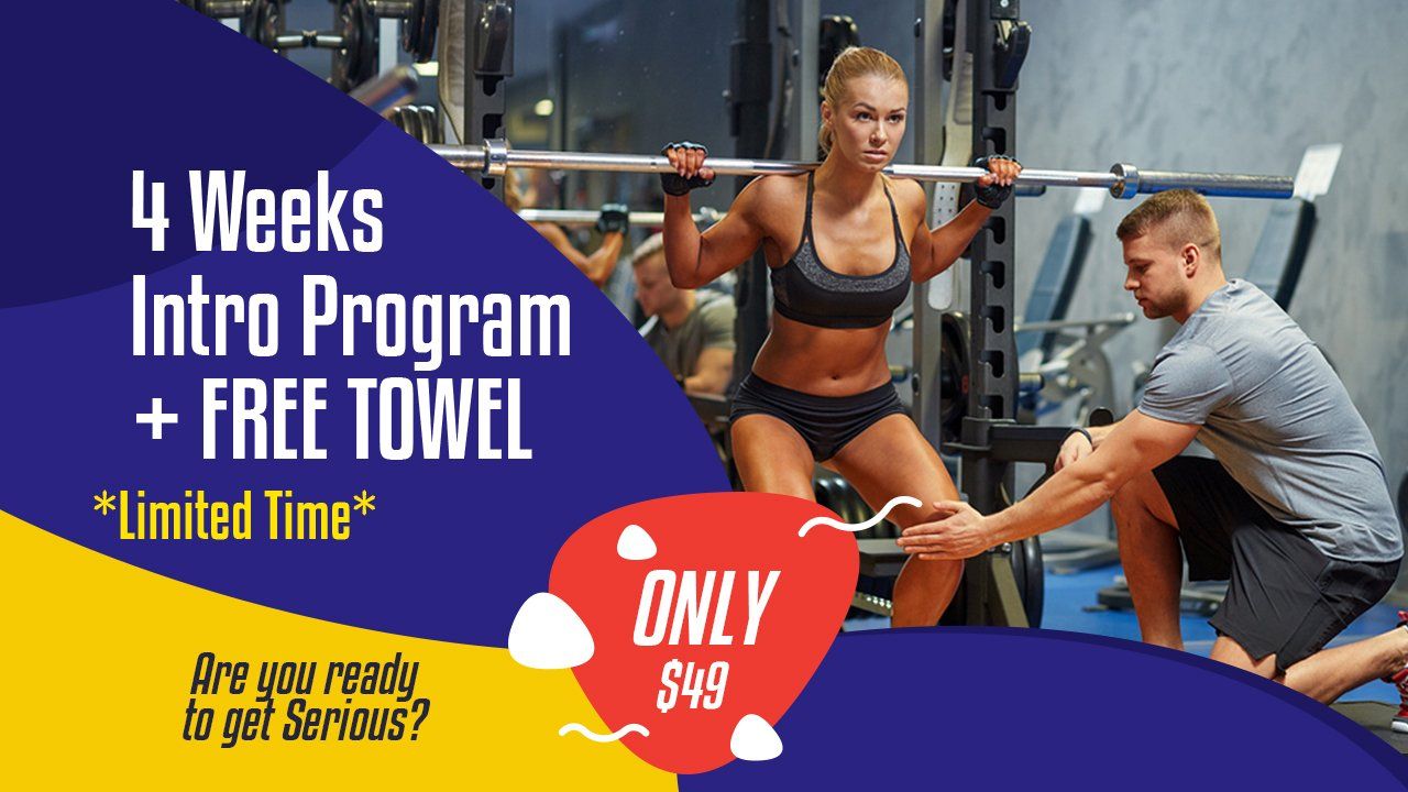 A man is helping a woman squat with a barbell in a gym.