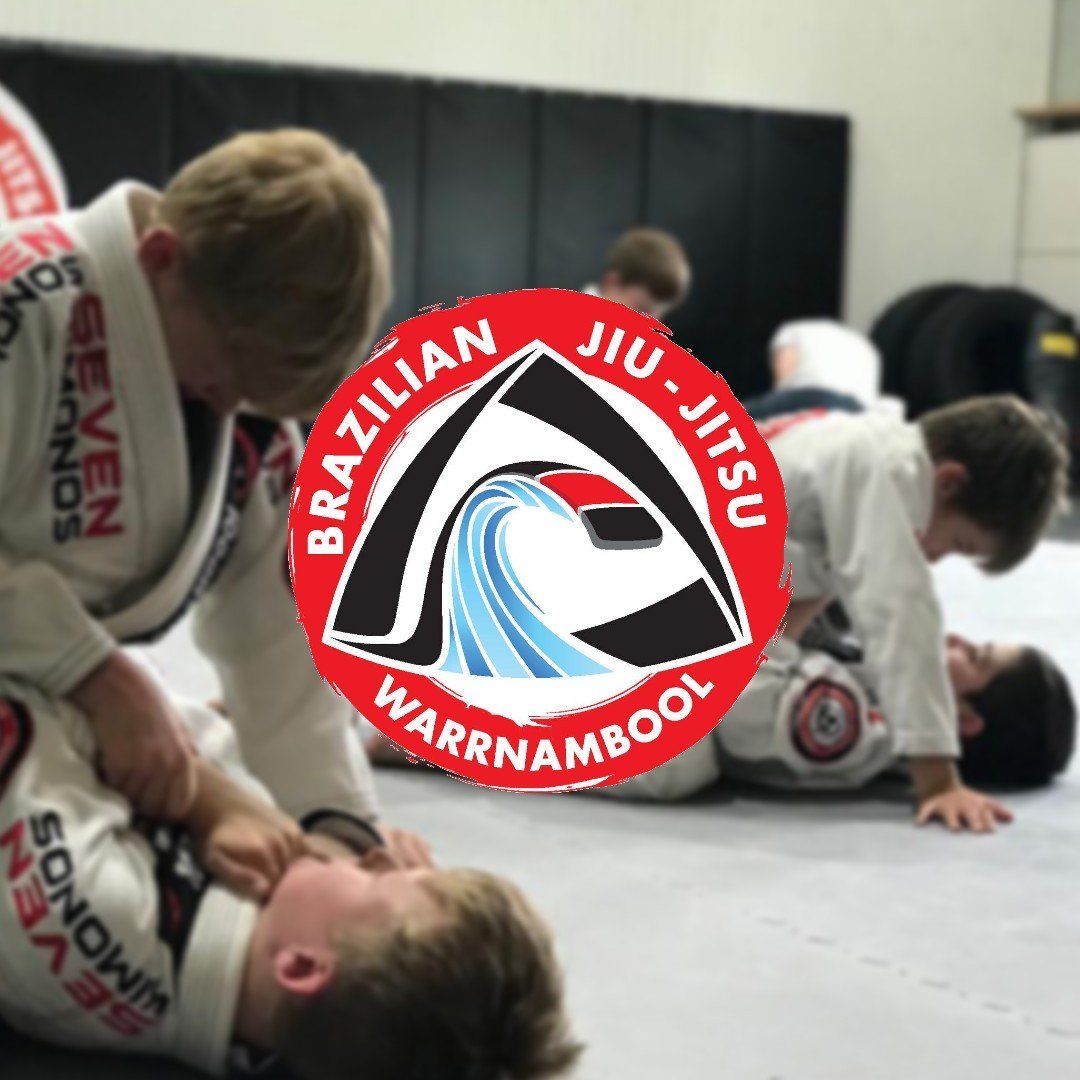 A group of brazilian jiu-jitsu fighters in a gym
