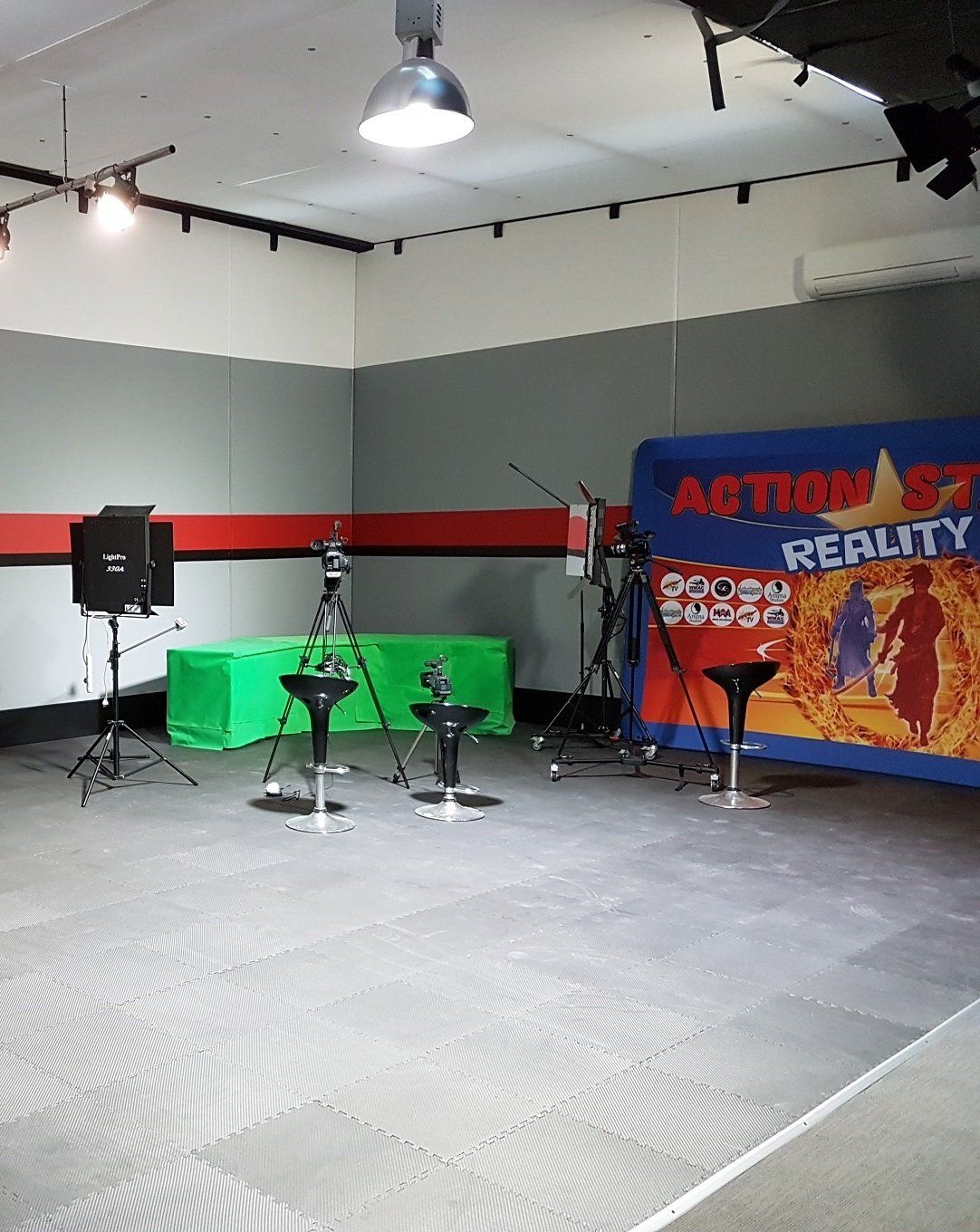 A room with a sign that says reality on it