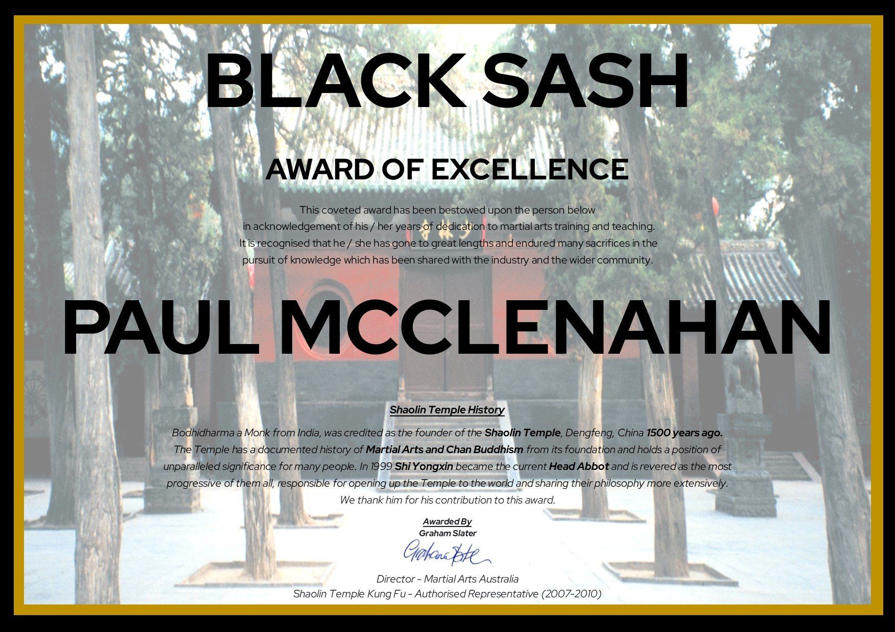 A black sash award of excellence for paul mcclenahan
