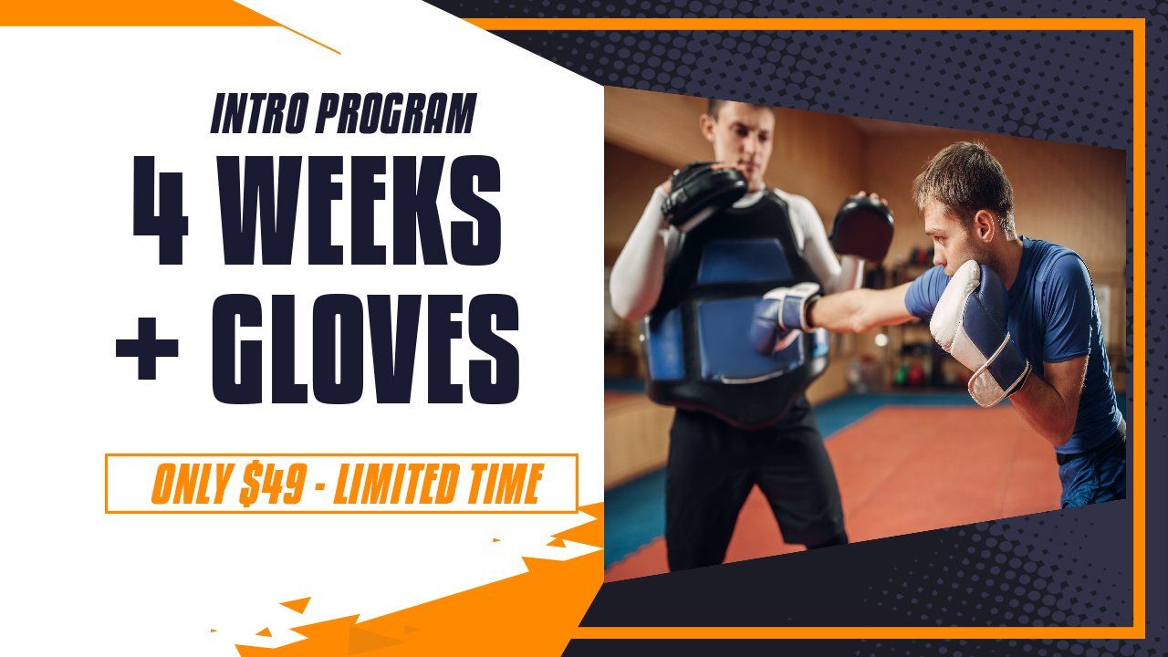 Two men are boxing in a gym with a sign that says 4 weeks + gloves