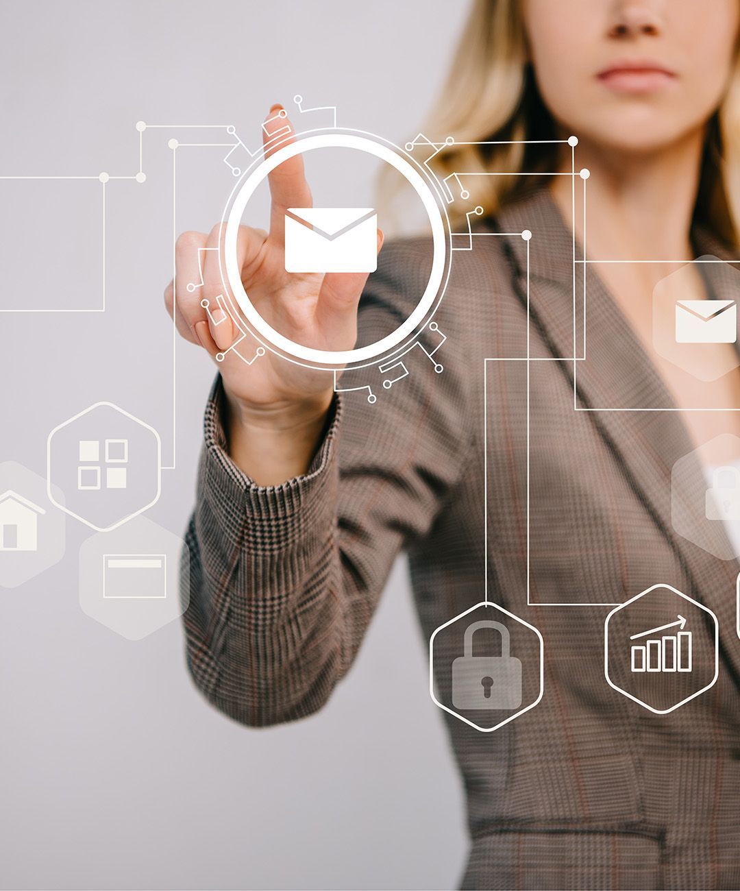 A woman in a suit is pressing a button on a screen