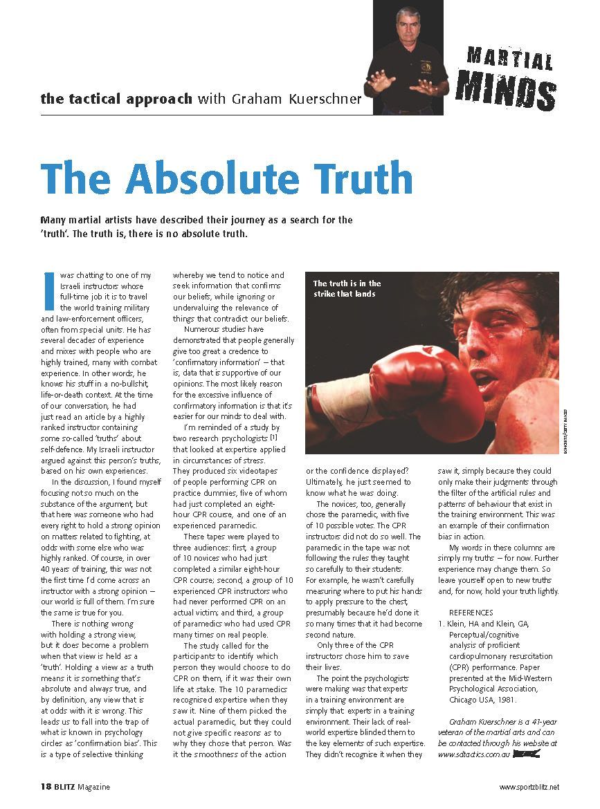 A newspaper article about the absolute truth with a picture of a man wearing boxing gloves.