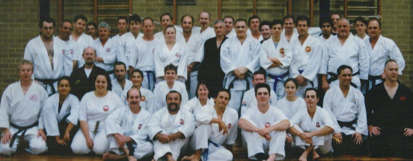 A large group of people are posing for a picture