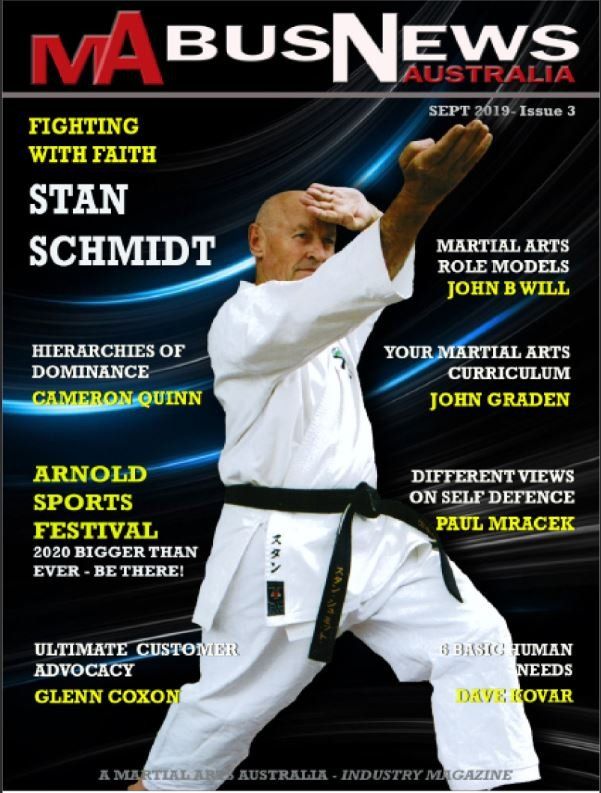 A man in a karate uniform is on the cover of a magazine