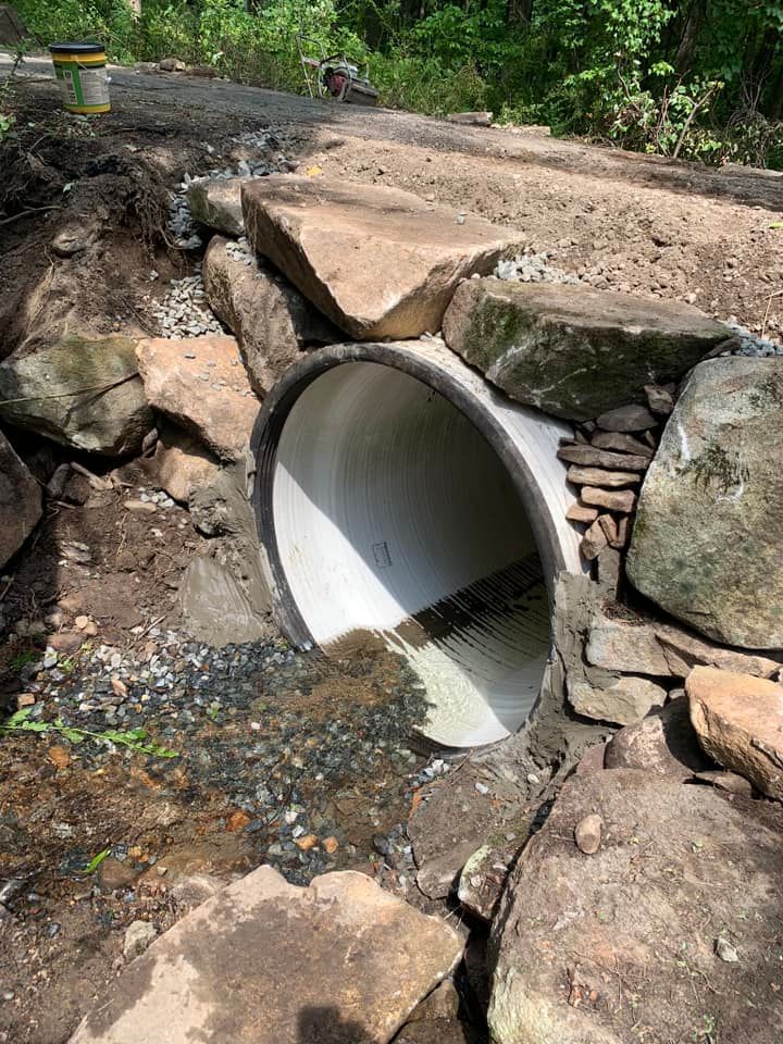 replace the deteriorating drainage culvert