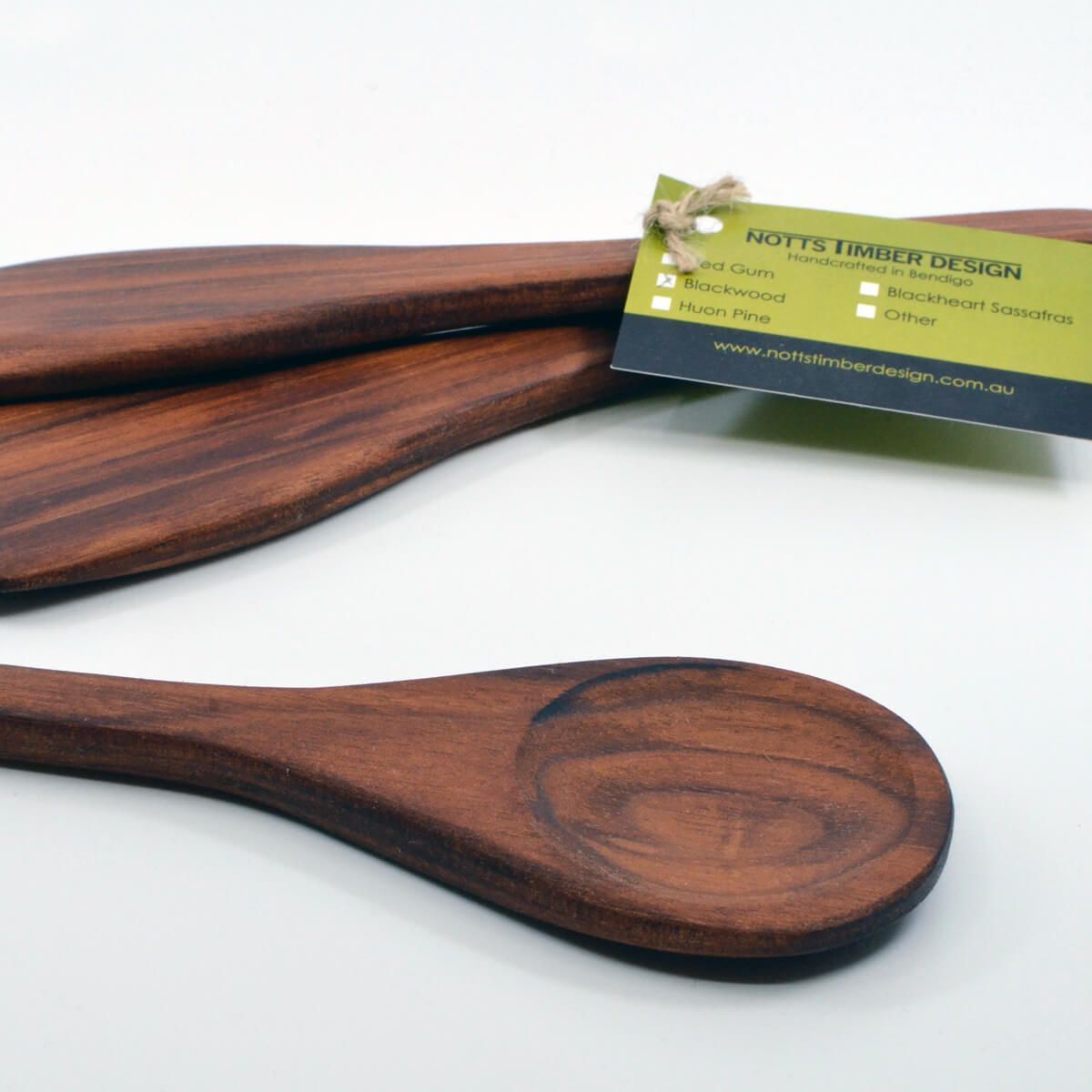 a set of blackwood timber salad servers