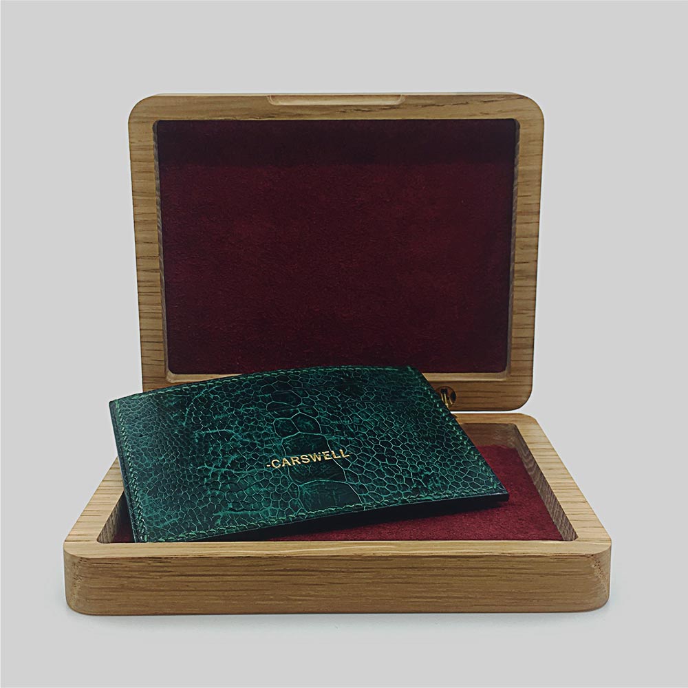 Ostrich leather card wallets Price Range $410-$465