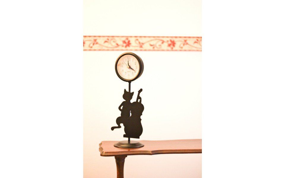 Orologio con piedistallo in ferro battuto