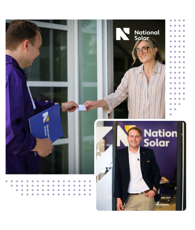 A man is giving a business card to a woman in front of a national solar sign