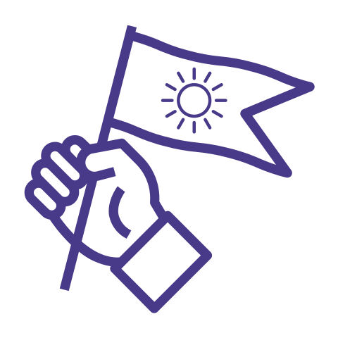 A hand is holding a flag with a sun on it.