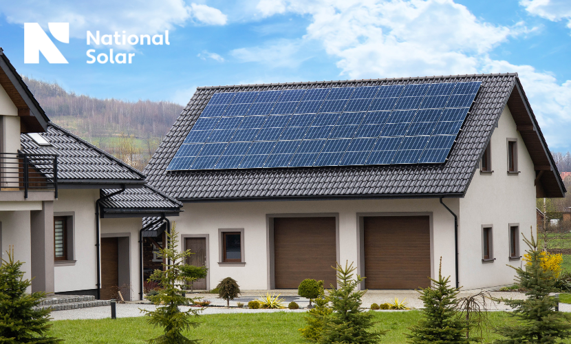 A house with solar panels on the roof is sponsored by national solar