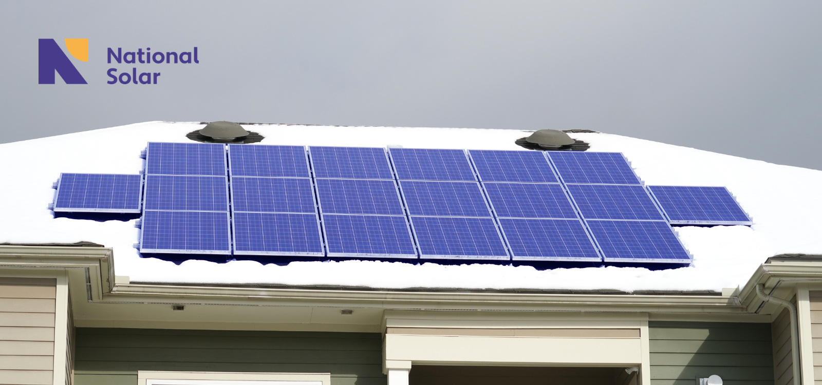 A house with solar panels on the roof and a national solar logo in the background