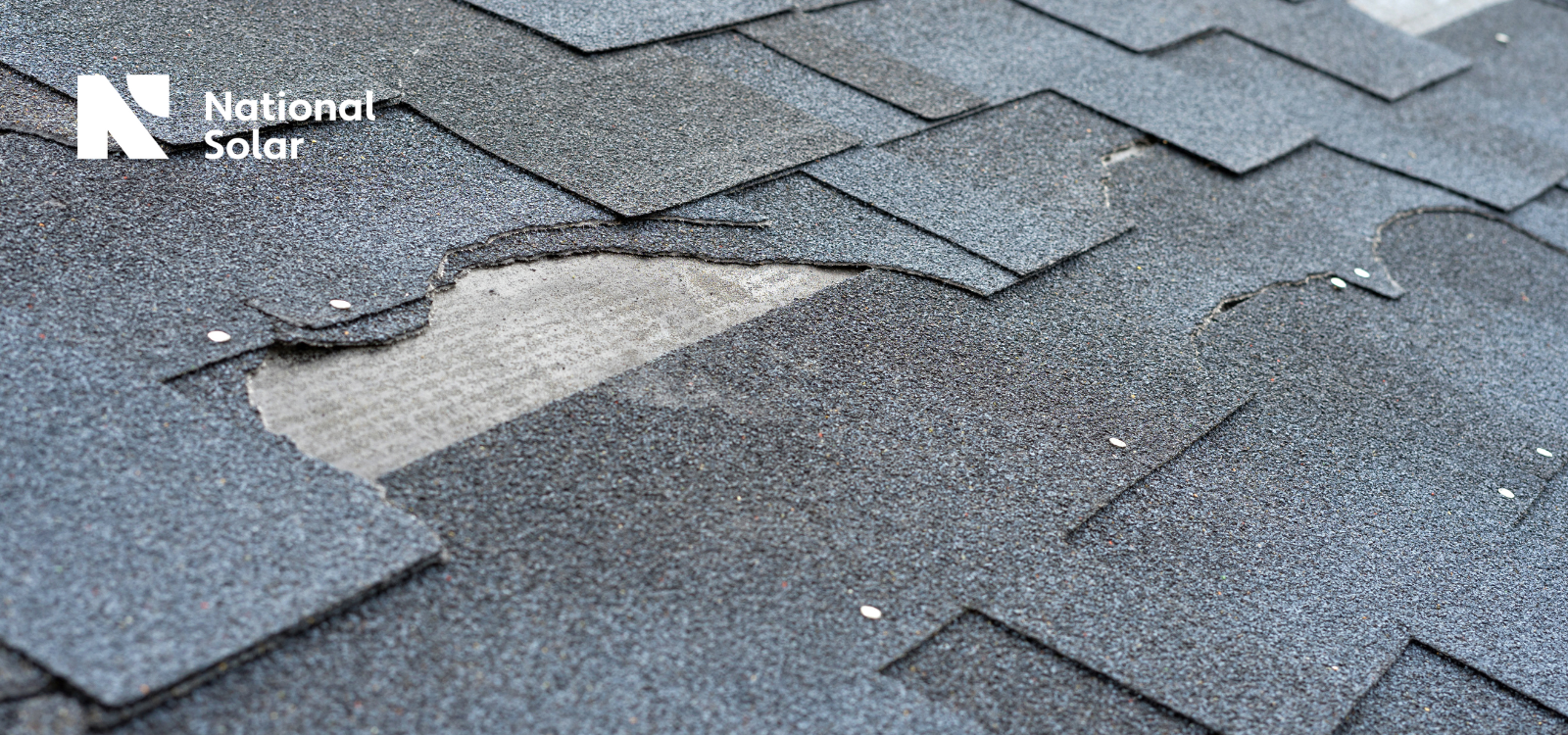 A close up of a roof with a hole in it