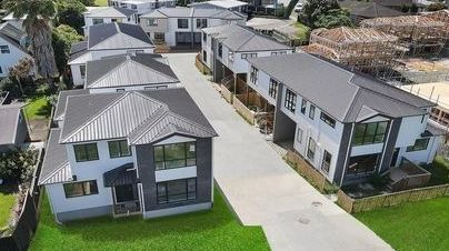 Two-story townhouses in a multi-unit development Auckland