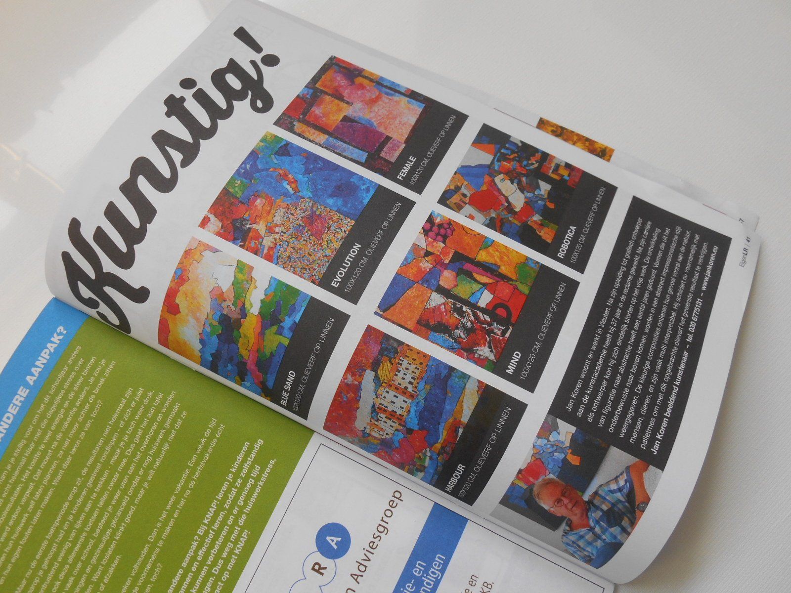 Een tijdschrift is opengeslagen op een pagina met de tekst kunstig