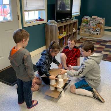children playing cups