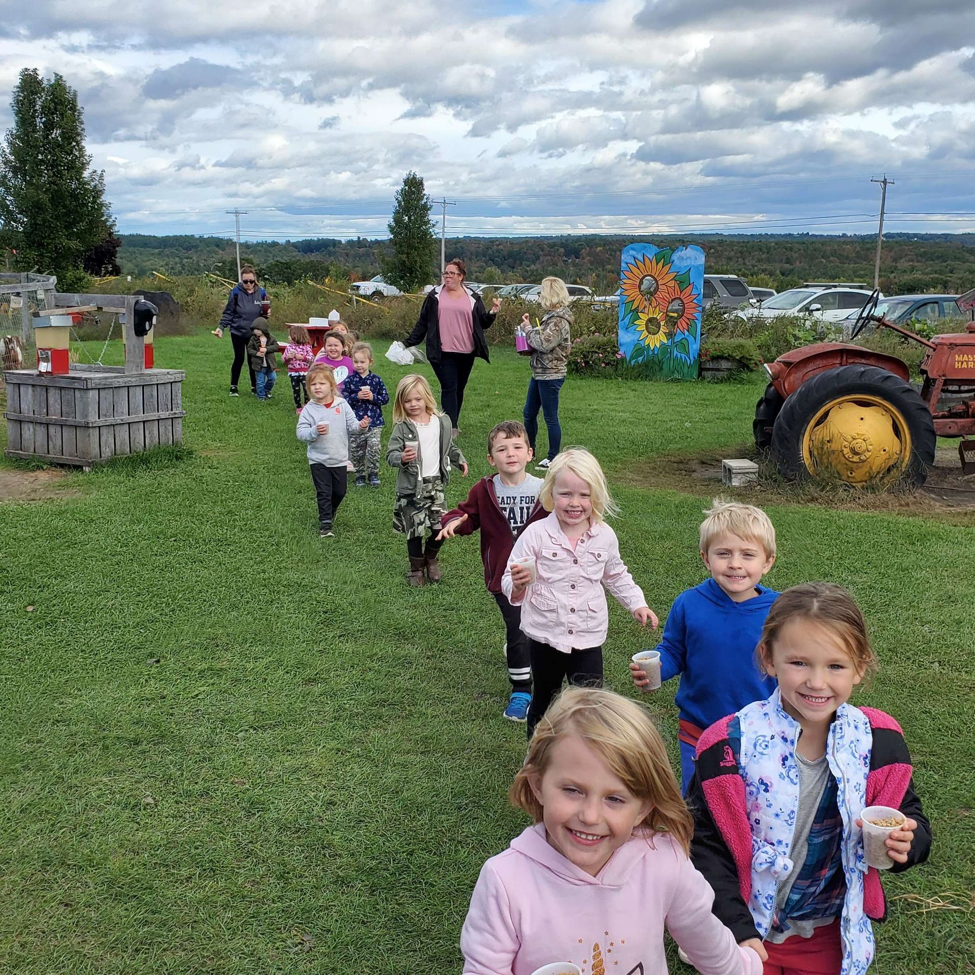 children running on the grass
