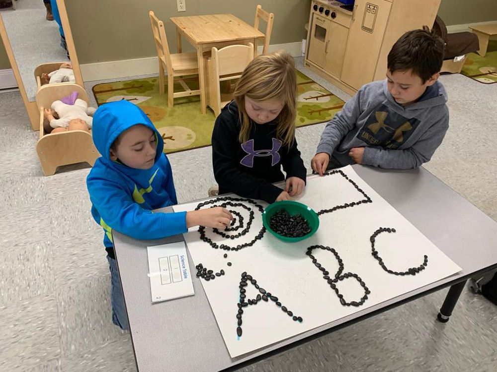 kids playing seeds alphabet