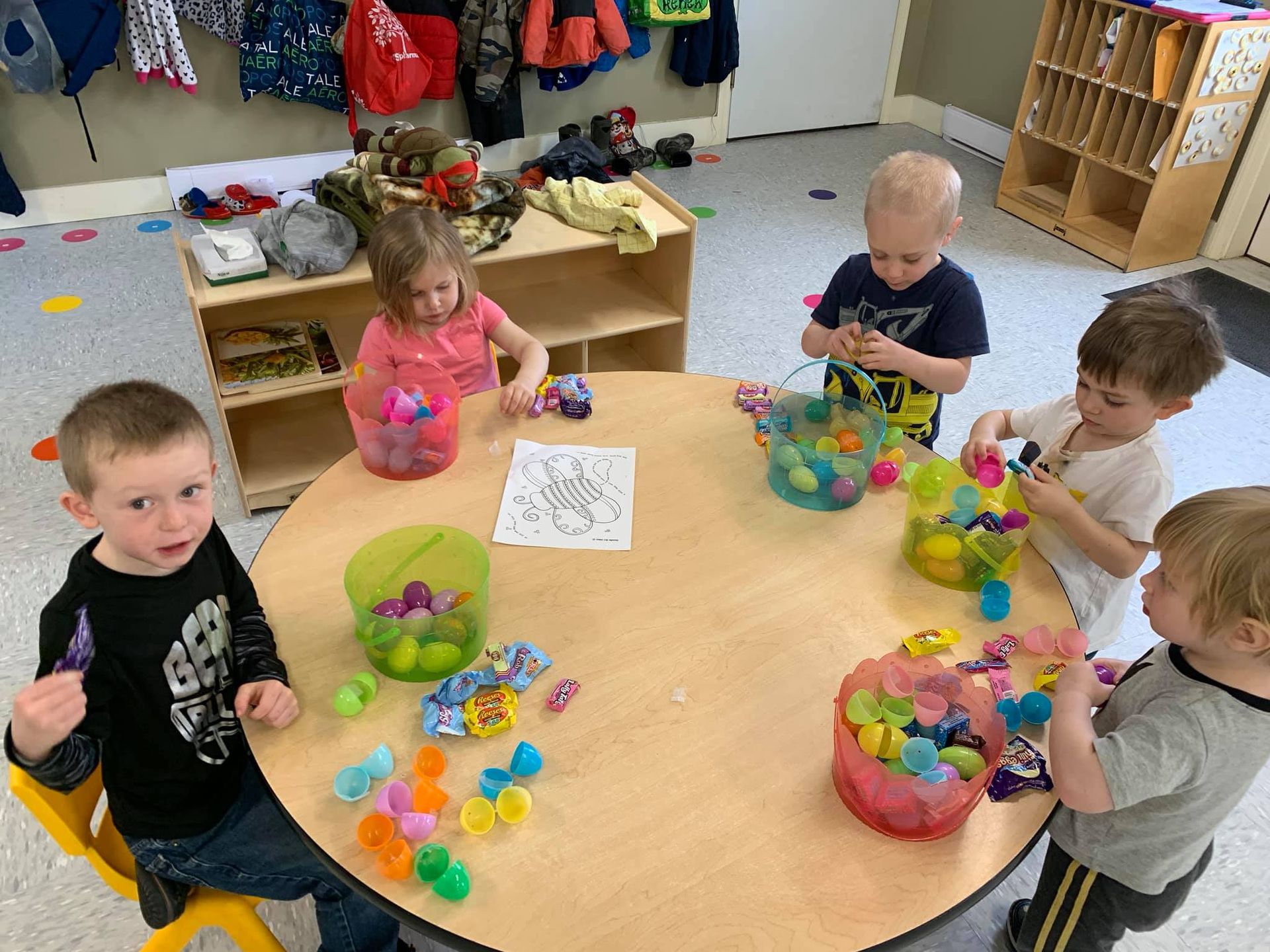 kids opening their easter eggs