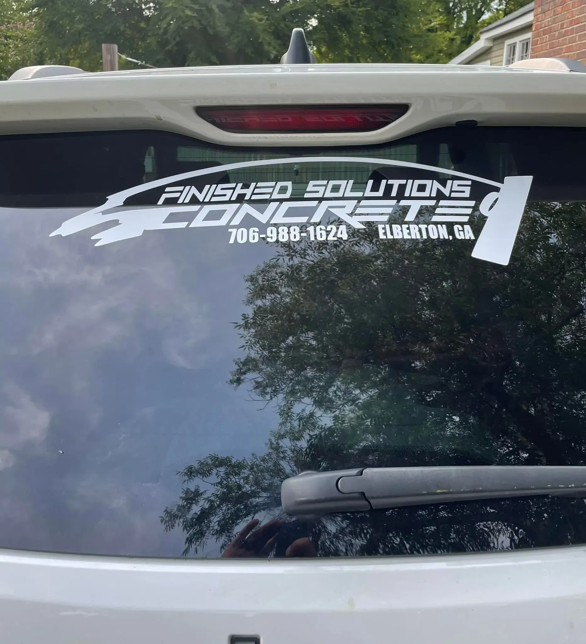 White car rear window with a 