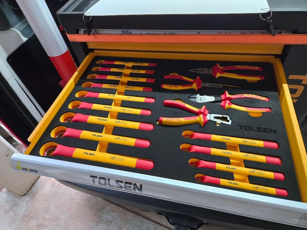 Open toolbox drawer with yellow and red insulated tools neatly arranged in foam inserts. — Cool Cars NT in Anula, NT