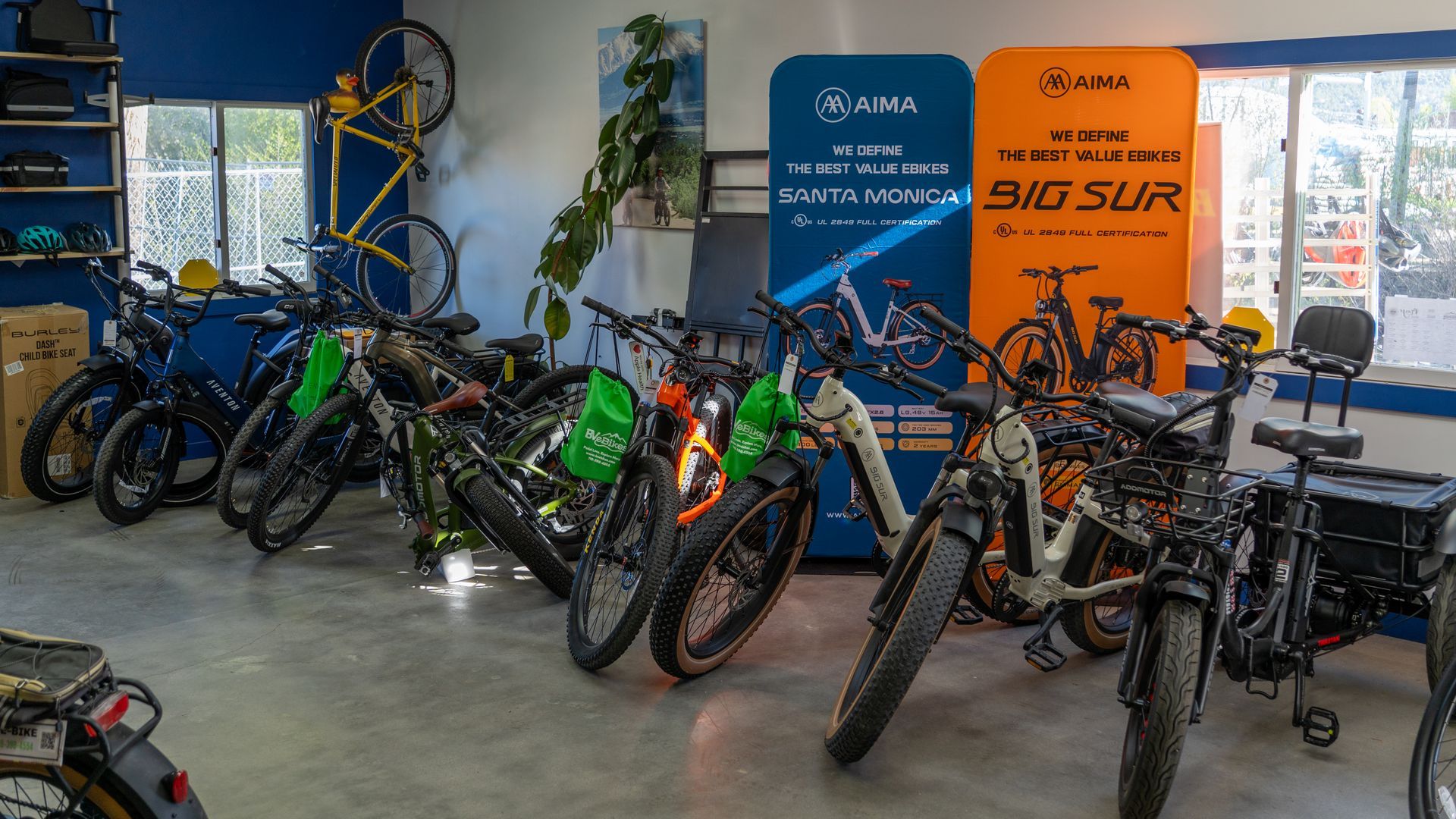 A white electric bike with brown tires on a white background.