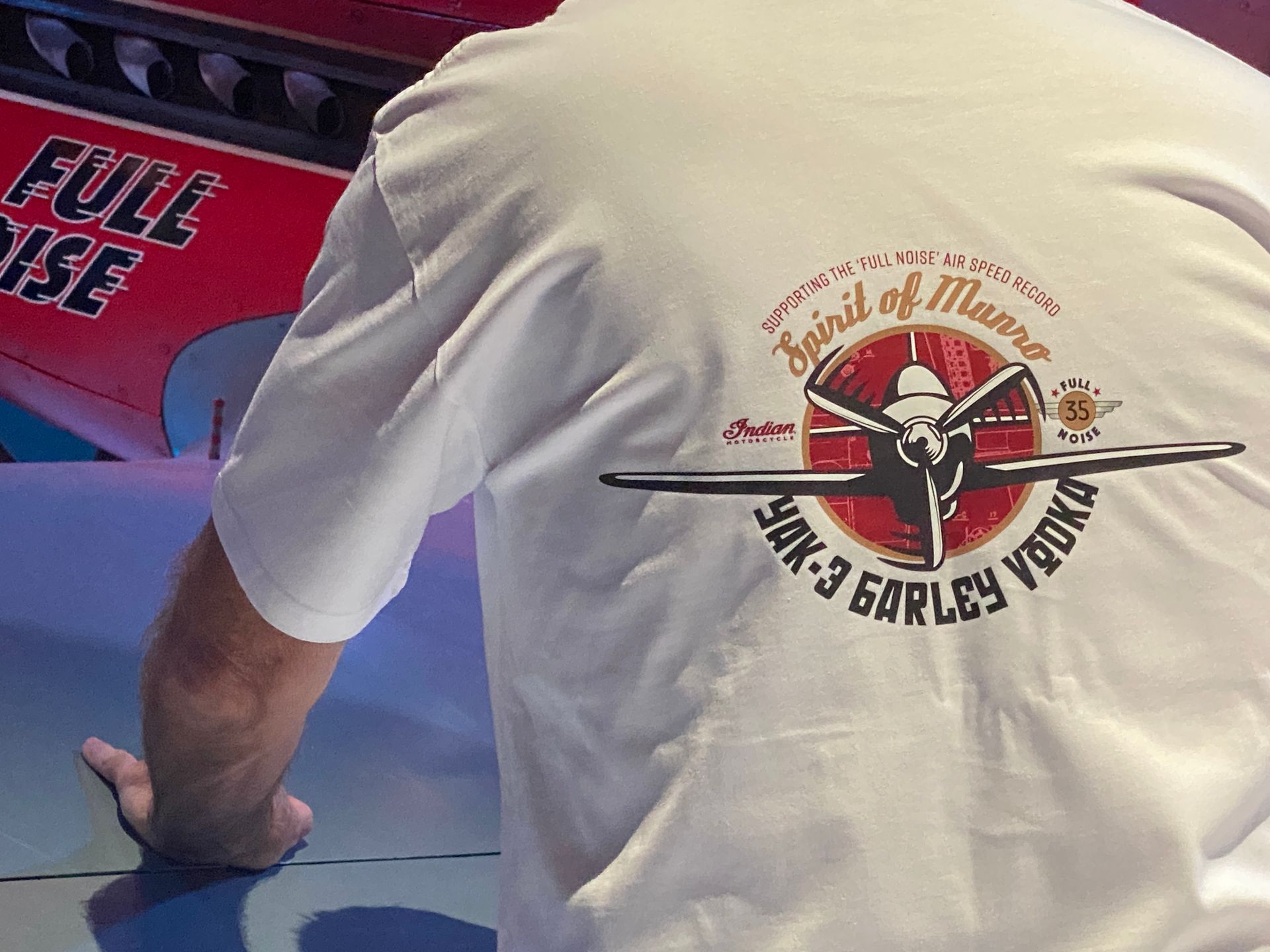 Fighter Flights crew wearing Full Noise t-shirts.