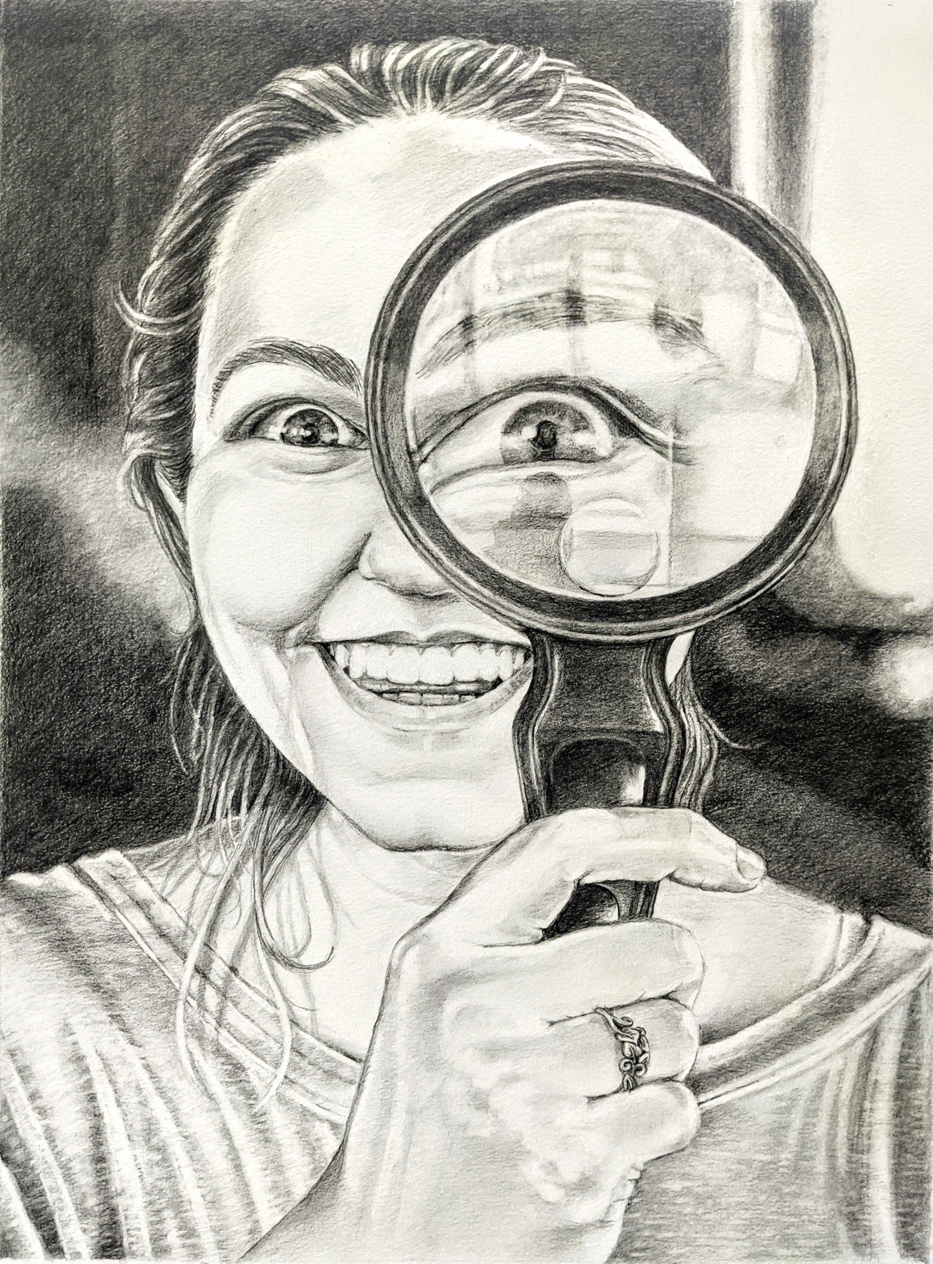 Graphite drawing of my daughter Rylie holding a magnifying glass to her eye