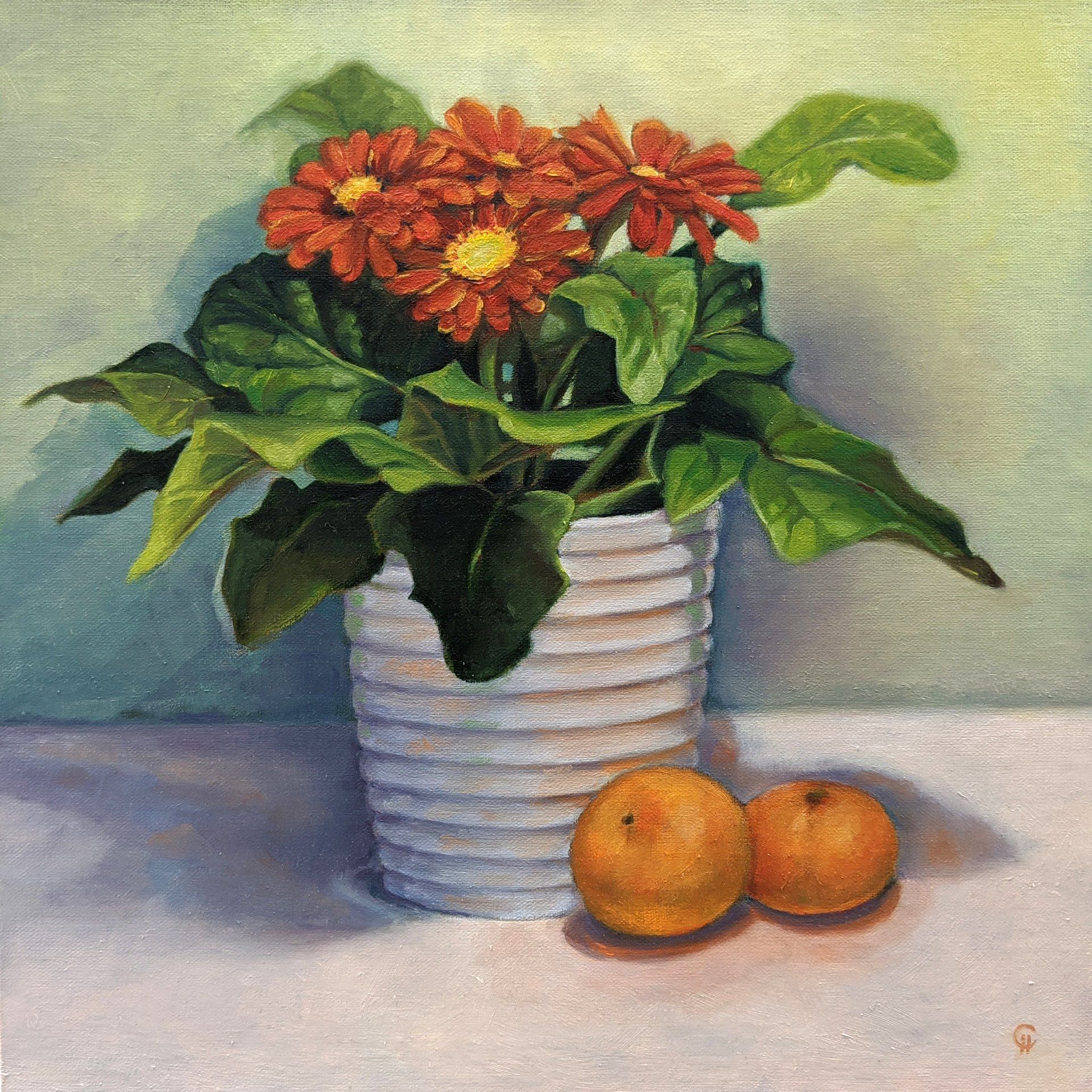 Painting of orange gerbera daisies in a white pot with two madarin oranges.