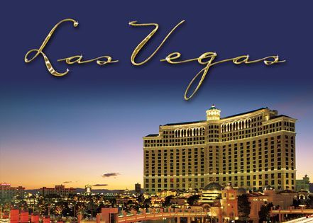 A picture of las vegas with a large building in the background