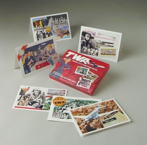 Tws greeting cards are displayed on a table