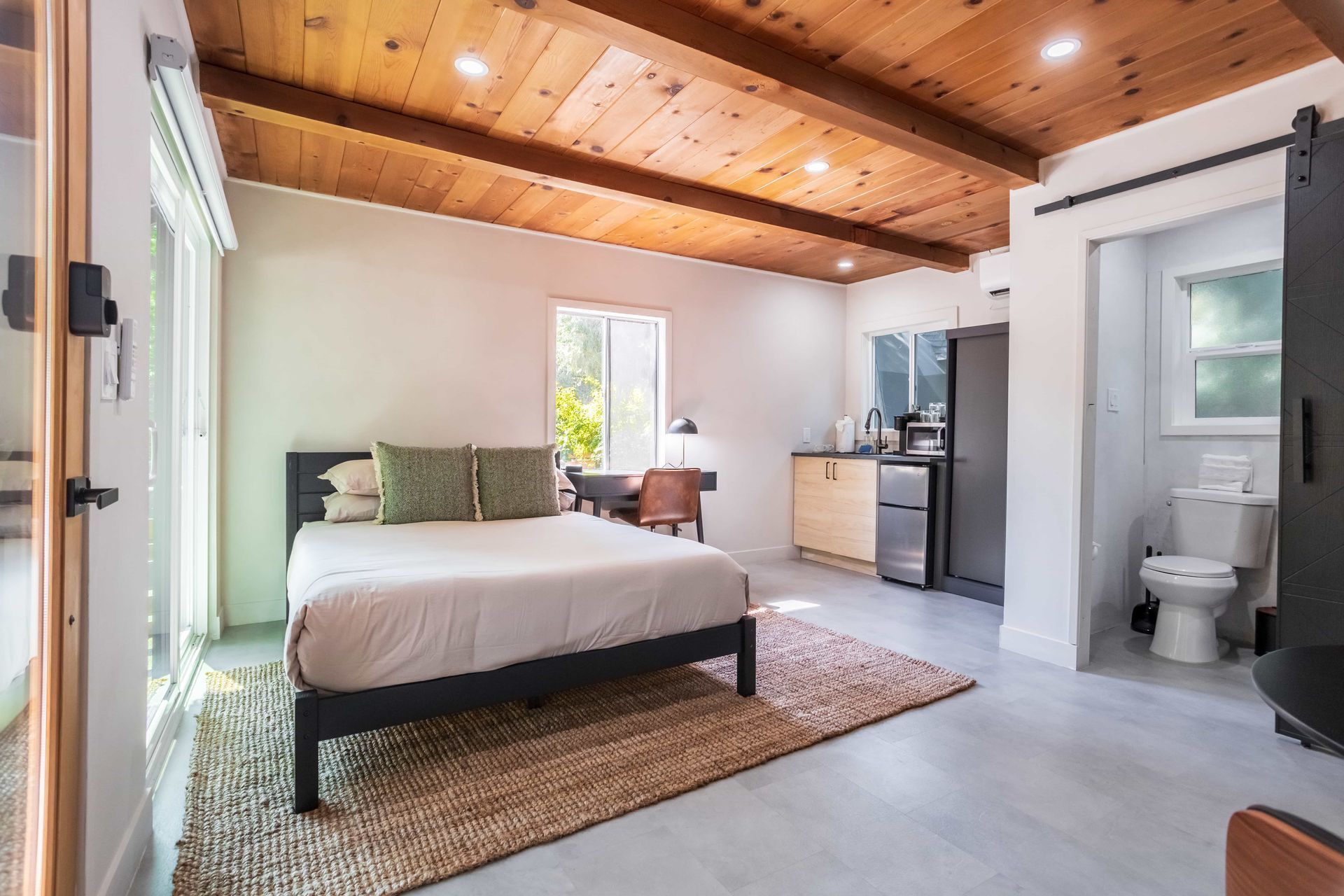 There is a large bed in the middle of the room.