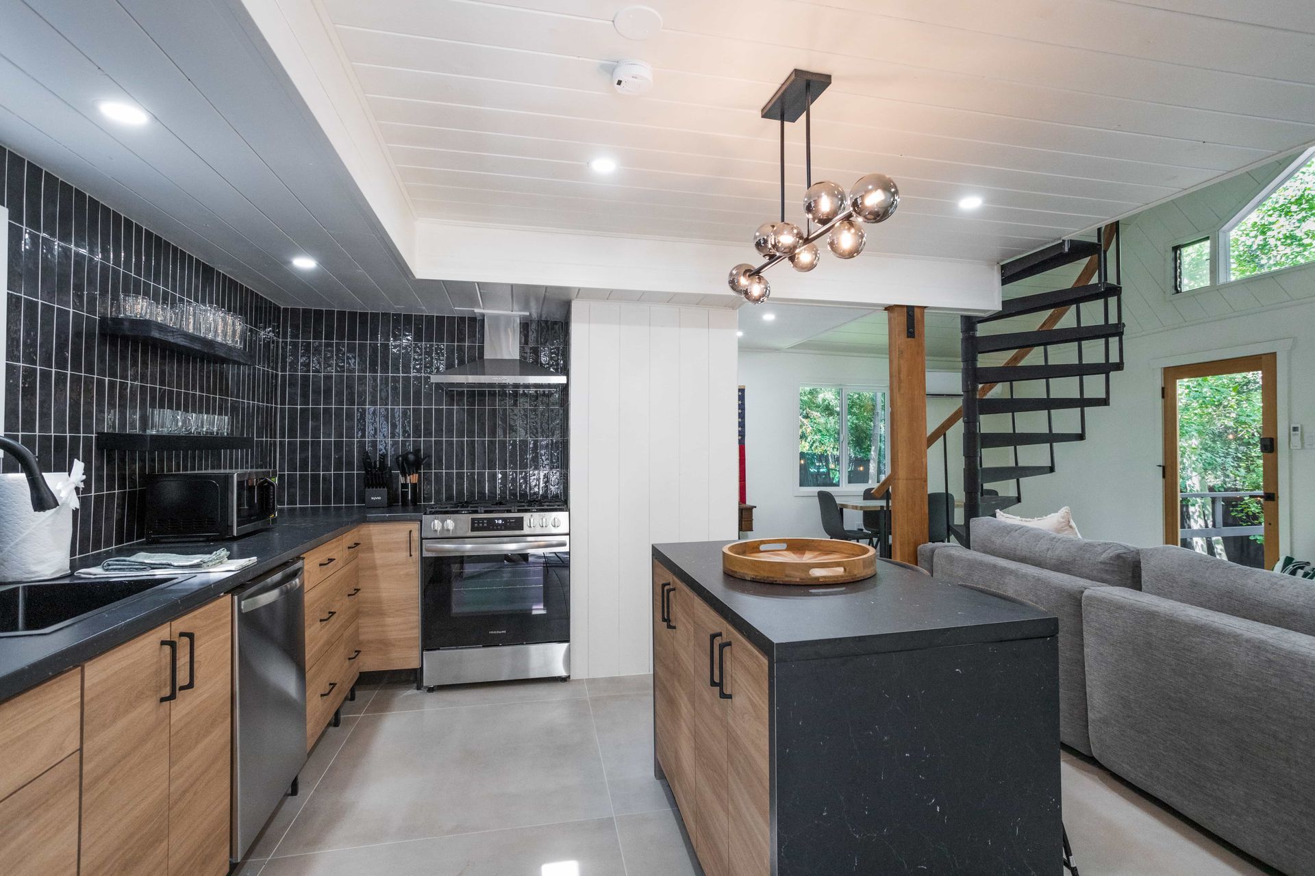 A kitchen with a large island in the middle of it