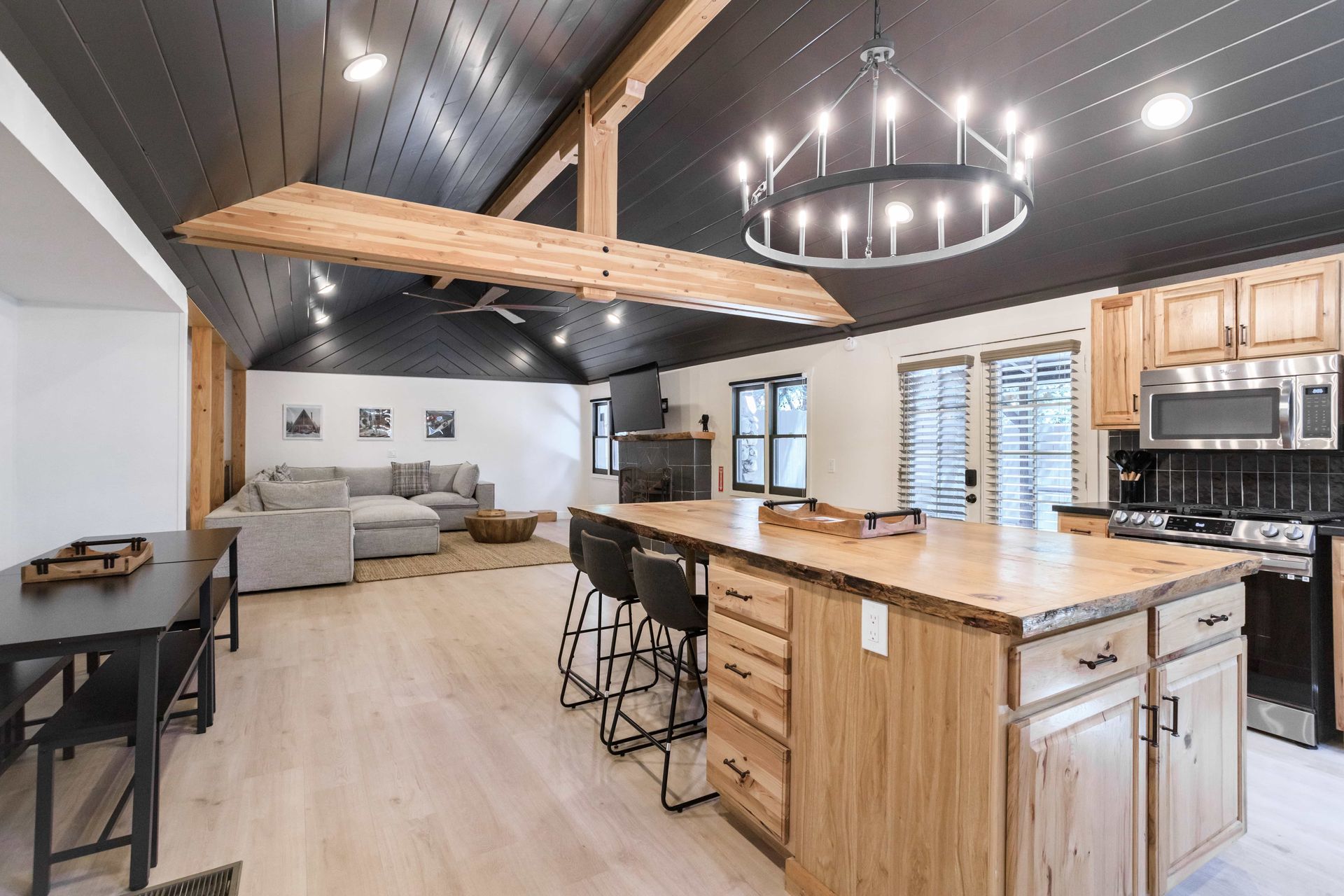 There is a large island in the middle of the kitchen.