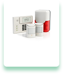 A picture of a security system with two motion sensors and a remote control.