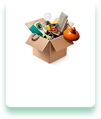 A cardboard box filled with various items on a white background.