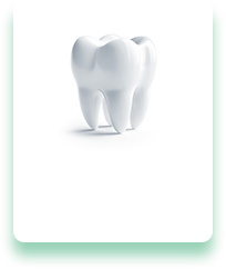 A white tooth is sitting on a white surface.